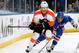 NEW YORK, NY - APRIL 27: Marc Staal #18 of the New York Rangers attempts to poke the puck away from Claude Giroux #28 of the Philadelphia Flyers in Game Five of the First Round of the 2014 Stanley Cup Playoffs at Madison Square Garden on April 27, 2014 i