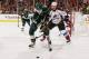 ST. PAUL, MN - APRIL 28: Charlie Coyle #3 of the Minnesota Wild skates with the puck while Erik Johnson #6 of the Colorado Avalanche defends during Game Six of the First Round of the 2014 Stanley Cup Playoffs on April 28, 2014 at the Xcel Energy Center i