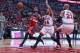Apr 20, 2014; Chicago, IL, USA; Washington Wizards guard John Wall (2) drives past Chicago Bulls guard D.J. Augustin (14) during the second quarter of game one of the first round of the 2014 NBA Playoffs at the United Center. Mandatory Credit: Dennis Wier
