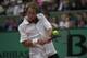 11Jun 2000: Magnus Norman of Sweden gets in a backhand whilst being beaten by Gustavo kuerton of Brazil in the Mens Singles Final at the French Open, Roland Garros, Paris, France. Mandatory Credit: Clive Brunskill/ALLSPORT