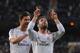 MADRID, SPAIN - APRIL 26: Daniel Carvajal (R) of Real Madrid CF celebrates beside Xabi Alonso after scoring Real's 4th goal from a free kick during the La Liga match between Real Madrid CF and CA Osasuna at the Santiago Bernabeu stadium on April 26, 2014
