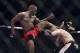 Apr 26, 2014; Baltimore, MD, USA; Glover Teixeira ducks under a kick from Jon Jones during the UFC light heavy weight championship fight at Baltimore Arena. Jones retained the light heavy height championship by defeating Teixeria. Mandatory Credit: To