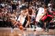 BROOKLYN, NY - APRIL 25: Deron Williams #8 of the Brooklyn Nets drives against the Toronto Raptors in Game Three of the Eastern Conference Quarterfinals during the NBA Playoffs on April 25, 2014 at the Barclays Center in Brooklyn, New York. NOTE TO USER: