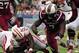 Jan 1, 2014; Orlando, FL, USA; South Carolina Gamecocks defensive end Jadeveon Clowney (7) knocks down Wisconsin Badgers running back Melvin Gordon (25) in the first quarter as the South Carolina Gamecocks face the Wisconsin Badgers in the Capital One Bow