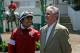 ALBANY, CA - APRIL 28: Apprentice Jockey Martin Garcia (L) of Mexico laughs with horse trainer Art Sherman before the start of the third race at Golden Gate Fields April 28, 2006 in Albany, California. Garcia, 21, came to the United States from Veracruz,