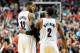 PORTLAND, OR - APRIL 27: Wesley Matthews #2 of the Portland Trail Blazers consoles LaMarcus Aldridge #12 of the Portland Trail Blazers after he was fouled in overtime of Game Four of the Western Conference Quarterfinals during the 2014 NBA Playoffs at t
