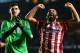 LONDON, ENGLAND - APRIL 30: Arda Turan (R) and Thibaut Courtois of Club Atletico de Madrid celebrate victory after the UEFA Champions League semi-final second leg match between Chelsea and Club Atletico de Madrid at Stamford Bridge on April 30, 2014 in Lo