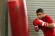 HAYWARD, CA - APRIL 24: Amir Khan in action during a workout session at Virgil Hunter's Gym on April 24, 2014 in Hayward, California. Kahn is preparing to take on Luis Collazo at the MGM Grand in Las Vegas on May 3, 2014. (Photo by Alexis Cuarezma/Getty