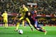 VILLARREAL, SPAIN - APRIL 27: Pedro Rodriguez of FC Barcelona duels for the ball with Javier Aquino of Villarreal CF during the La Liga match between Villarreal CF and FC Barcelona at El Madrigal on April 27, 2014 in Villarreal, Spain. (Photo by David R