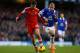 LIVERPOOL, ENGLAND - DECEMBER 29: Adam Lallana of Southampton competes with Ross Barkley of Everton during the Barclays Premier League match between Everton and Southampton at Goodison Park on December 29, 2013 in Liverpool, England. (Photo by Paul Thom