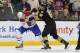 BOSTON, MA - MARCH 24: Kevan Miller #86 of the Boston Bruins fights against Travis Moen #32 of the Montreal Canadiens at the TD Garden on March 24, 2014 in Boston, Massachusetts. (Photo by Steve Babineau/NHLI via Getty Images)