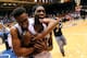 DURHAM, NC - JANUARY 13: Jabari Parker #1 and Amile Jefferson #21 of the Duke Blue Devils celebrate as they leave the floor following a last-second win over the Virginia Cavaliers at Cameron Indoor Stadium on January 13, 2014 in Durham, North Carolina. D