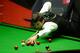 SHEFFIELD, ENGLAND - MAY 01: Ronnie O'Sullivan plays a shot against Barry Hawkins during their semi final in The Dafabet World Snooker Championship at Crucible Theatre on May 1, 2014 in Sheffield, England. (Photo by Gareth Copley/Getty Images)