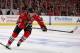 CHICAGO, IL - APRIL 27: Jonathan Toews #19 of the Chicago Blackhawks chases down the puck against the St. Louis Blues in Game Six of the First Round of the 2014 NHL Stanley Cup Playoffs at the United Center on April 27, 2014 in Chicago, Illinois. The Bla