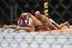 Pat Barry's UFC on Fox 3 opponent, Lavar Johnson, sprawls as the two hit the mat.