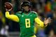 EUGENE, OR - NOVEMBER 29: Quarterback Marcus Mariota #8 of the Oregon Ducks throws a pass against the Oregon State Beavers during the 117th playing of the Civil War on November 29, 2013 at the Autzen Stadium in Eugene, Oregon. (Photo by Jonathan Ferrey/