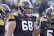 IOWA CITY, IA - NOVEMBER 2: Offensive lineman Brandon Scherff #68 of the Iowa Hawkeyes during a break in the action in the third quarter against the Wisconsin Badgers on November 2, 2013 at Kinnick Stadium in Iowa City, Iowa. Wisconsin won 28-9. (Photo b