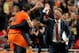 AMSTERDAM, NETHERLANDS - OCTOBER 11: Robin van Persie of Holland celebrates with Patrick Kluivert and manager Luis van Gaal after scoring their fourth goal during the FIFA 2014 World Cup Qualifing match between Holland and Hungary at Amsterdam Arena on O
