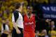 OAKLAND, CA - MAY 01: Chris Paul #3 of the Los Angeles Clippers argues a call with referee John Goble during their game against the Golden State Warriors in Game Six of the Western Conference Quarterfinals during the 2014 NBA Playoffs at ORACLE Arena on