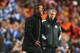 LONDON, ENGLAND - APRIL 30: Diego Simeone, coach of Club Atletico de Madrid reacts with Jose Mourinho, manager of Chelsea during the UEFA Champions League semi-final second leg match between Chelsea and Club Atletico de Madrid at Stamford Bridge on April