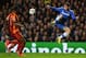 LONDON, ENGLAND - MARCH 18: Eden Hazard of Chelsea jumps for the ball as Emmanuel Eboue (L) and Aurelien Chedjou of Galatasaray look on during the UEFA Champions League Round of 16 second leg match between Chelsea and Galatasaray AS at Stamford Bridge on