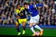 LIVERPOOL, ENGLAND - FEBRUARY 16: Everton player Ross Barkley (r) challenges Wayne Routledge of Swansea during the FA Cup Fifth Round match between Everton and Swansea City at Goodison Park on February 16, 2014 in Liverpool, England. (Photo by Stu Forst