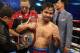 LAS VEGAS, NV - APRIL 12: Manny Pacquiao celebrates his victory over Timothy Bradley at the MGM Grand Garden Arena on April 12, 2014 in Las Vegas, Nevada. (Photo by Jeff Gross/Getty Images)