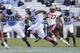 Oct 26, 2013; Chapel Hill, NC, USA; North Carolina Tar Heels tight end Eric Ebron (85) drives past Boston College Eagles defensive back Bryce Jones (17) during the second half at Kenan Memorial Stadium. North Carolina won 34-10. Mandatory Credit: Liz Cond