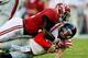 TUSCALOOSA, AL - SEPTEMBER 28: C.J. Mosley #32 of the Alabama Crimson Tide tackles Bo Wallace #14 of the Mississippi Rebels at Bryant-Denny Stadium on September 28, 2013 in Tuscaloosa, Alabama. (Photo by Kevin C. Cox/Getty Images)