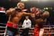 LAS VEGAS, NV - MAY 05: (L-R) Miguel Cotto connects with a left punch to the head of Floyd Mayweather Jr. during their WBA super welterweight title fight at the MGM Grand Garden Arena on May 5, 2012 in Las Vegas, Nevada. (Photo by Al Bello/Getty Images)