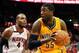 May 1, 2014; Atlanta, GA, USA; Indiana Pacers center Roy Hibbert (55) controls the ball against Atlanta Hawks Paul Millsap (4) in game six of the first round of the 2014 NBA Playoffs at Philips Arena. The Pacers defeated the Hawks 95-88. Mandatory Credit: