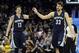 Feb 9, 2014; Cleveland, OH, USA; Memphis Grizzlies small forward Mike Miller (13) and center Marc Gasol (33) celebrate in the fourth quarter against the Cleveland Cavaliers at Quicken Loans Arena. Mandatory Credit: David Richard-USA TODAY Sports