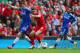 LIVERPOOL, ENGLAND - APRIL 27: Nemanja Matic of Chelsea and Joe Allen of Liverpool compete for the ball during the Barclays Premier League match between Liverpool and Chelsea at Anfield on April 27, 2014 in Liverpool, England. (Photo by Clive Brunskill/