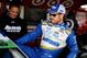 RICHMOND, VA - APRIL 25: Brian Vickers, driver of the #55 Aaron's Dream Machine Toyota, climbs into his car in the garage area during practice for the NASCAR Sprint Cup Series Toyota Owners 400 at Richmond International Raceway on April 25, 2014 in Richm