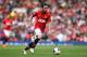 MANCHESTER, ENGLAND - MAY 03: Juan Mata of Manchester United runs with the ball during the Barclays Premier League match between Manchester United and Sunderland at Old Trafford on May 3, 2014 in Manchester, England. (Photo by Shaun Botterill/Getty Imag