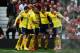 MANCHESTER, ENGLAND - MAY 03: Sebastian Larsson (3rd L) of Sunderland is congratulated by teammates after scoring the opening goal during the Barclays Premier League match between Manchester United and Sunderland at Old Trafford on May 3, 2014 in Manche