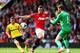 MANCHESTER, ENGLAND - MAY 03: Phil Jones of Manchester United shepherds the ball to his goalkeeper David De Gea of Manchester United during the Barclays Premier League match between Manchester United and Sunderland at Old Trafford on May 3, 2014 in Manch