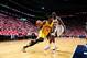 ATLANTA, GA - MAY 1: Paul George #24 of the Indiana Pacers drives to the basket during Game Six of the Eastern Conference Quarterfinals against Paul Millsap #4 of the Atlanta Hawks on May 1, 2014 at Philips Arena in Atlanta, Georgia. NOTE TO USER: User e