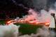 ROME, ITALY - MAY 03: SSC Napoli fans throw flares before the TIM Cup final match between ACF Fiorentina and SSC Napoli at Olimpico Stadium on May 3, 2014 in Rome, Italy. (Photo by Paolo Bruno/Getty Images)