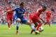 LIVERPOOL, ENGLAND - APRIL 27: Cesar Azpilicueta of Chelsea marshalls Raheem Sterling of Liverpool during the Barclays Premier League match between Liverpool and Chelsea at Anfield on April 27, 2014 in Liverpool, England. (Photo by Clive Brunskill/Getty