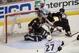 May 3, 2014; Anaheim, CA, USA; Los Angeles Kings right wing Marian Gaborik (12) passes the puck in between Anaheim Ducks goalie Jonas Hiller (1) and defenseman Francois Beauchemin (23) to Los Angeles Kings defenseman Alec Martinez (27) for an assist on t