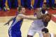 May 3, 2014; Los Angeles, CA, USA; Los Angeles Clippers center DeAndre Jordan (right) attempts to hold onto the ball defended by Golden State Warriors guard Stephen Curry (left) during the first quarter in game seven of the first round of the 2014 NBA Pla