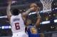 Apr 19, 2014; Los Angeles, CA, USA; Los Angeles Clippers center DeAndre Jordan (6) defends a shot by Golden State Warriors forward Harrison Barnes (40) in the first half in game one during the first round of the 2014 NBA Playoffs at Staples Center. Mandat