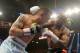 LAS VEGAS, NV - MAY 03: (L-R) Marcos Maidana and Floyd Mayweather Jr. exchange blows during their WBC/WBA welterweight unification fight at the MGM Grand Garden Arena on May 3, 2014 in Las Vegas, Nevada. (Photo by Harry How/Getty Images)