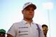Valtteri Bottas displaying three new sponsor logos.