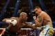 LAS VEGAS, NV - MAY 03: (L-R) Floyd Mayweather Jr. throws a left at Marcos Maidana during their WBC/WBA welterweight unification fight at the MGM Grand Garden Arena on May 3, 2014 in Las Vegas, Nevada. (Photo by Harry How/Getty Images)