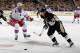 PITTSBURGH, PA - MAY 2: Chris Kunitz #14 of the Pittsburgh Penguins moves the puck in front of Anton Stralman #6 of the New York Rangers in Game One of the Second Round of the 2014 Stanley Cup Playoffs at Consol Energy Center on May 2, 2014 in Pittsburgh