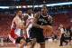 TORONTO,ON - MAY 4: Joe Johnson #7 of the Brooklyn Nets drives to the basket during Game seven of the Quarterfinal NBA Eastern Conference playoff game against Greivis Vasquez #21 of the Toronto Raptors at the Air Canada Centre on May 4, 2014 in Toronto, O