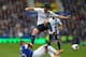 LIVERPOOL, ENGLAND - MAY 03: Samir Nasri of Manchester City hurdles the tackle of James McCarthy of Everton during the Barclays Premier League match between Everton and Manchester City at Goodison Park on May 3, 2014 in Liverpool, England. (Photo by Cli