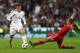 MADRID, SPAIN - APRIL 23: Gareth Bale of Real Madrid takes on Philipp Lahm of Bayern Muenchen during the UEFA Champions League semi-final first leg match between Real Madrid and FC Bayern Muenchen at the Estadio Santiago Bernabeu on April 23, 2014 in Madr